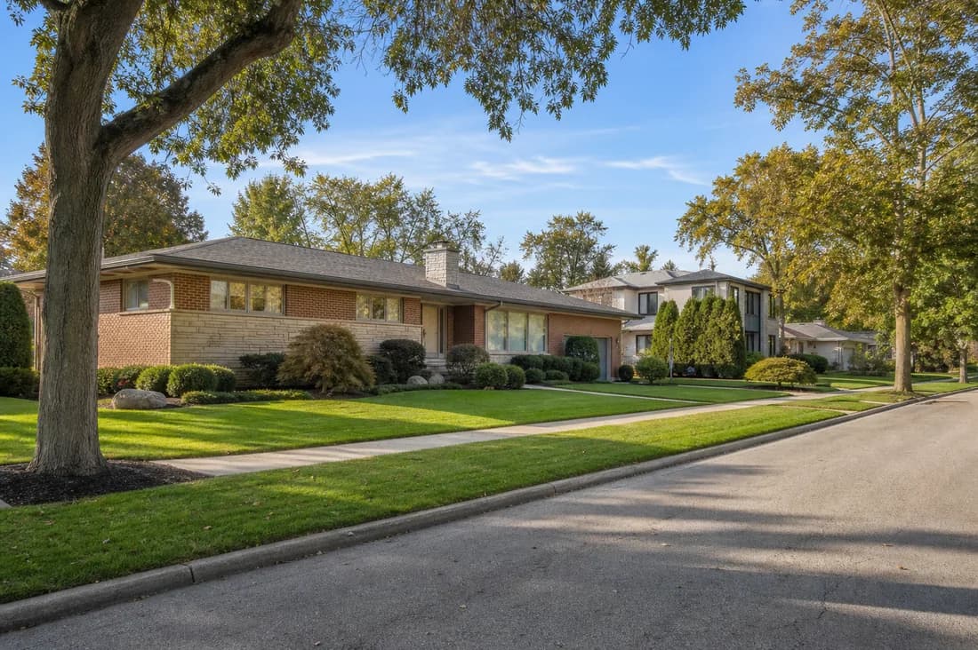 Leafy Beachwood neighborhood with a mid-century brick home