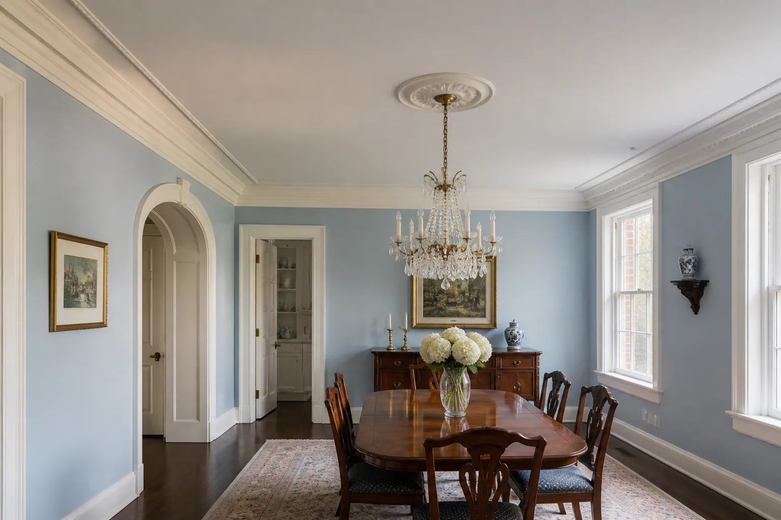 Dining room ceiling drywall repair with a seamless finish and restored crown molding